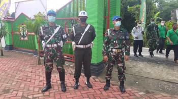  Bersama Polisi Militer, Satgas TMMD Kodim Bojonegoro Mengamankan Giat Penutupan